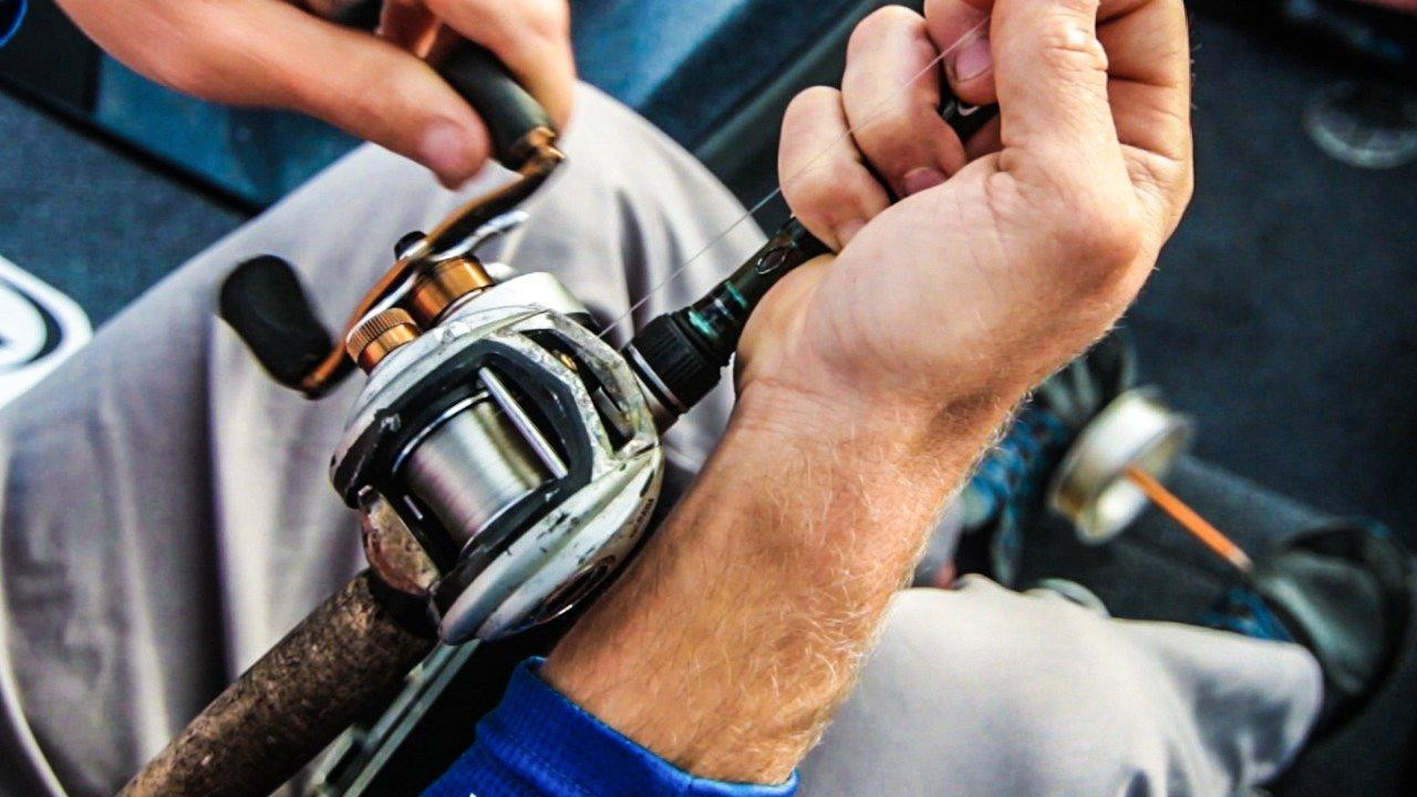 How to Spool Fishing Line on a Casting Reel - Wired2Fish