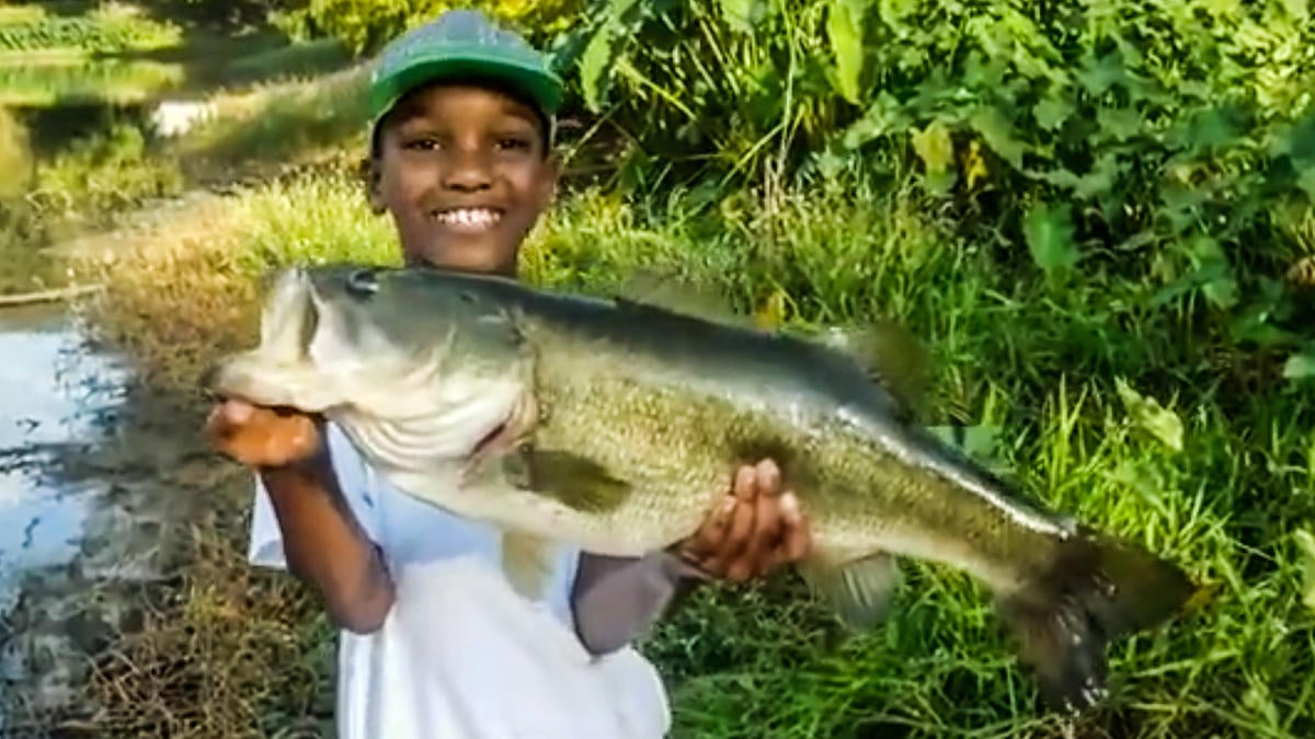Young Man Catches, Releases Huge Bass from Bank - Wired2Fish