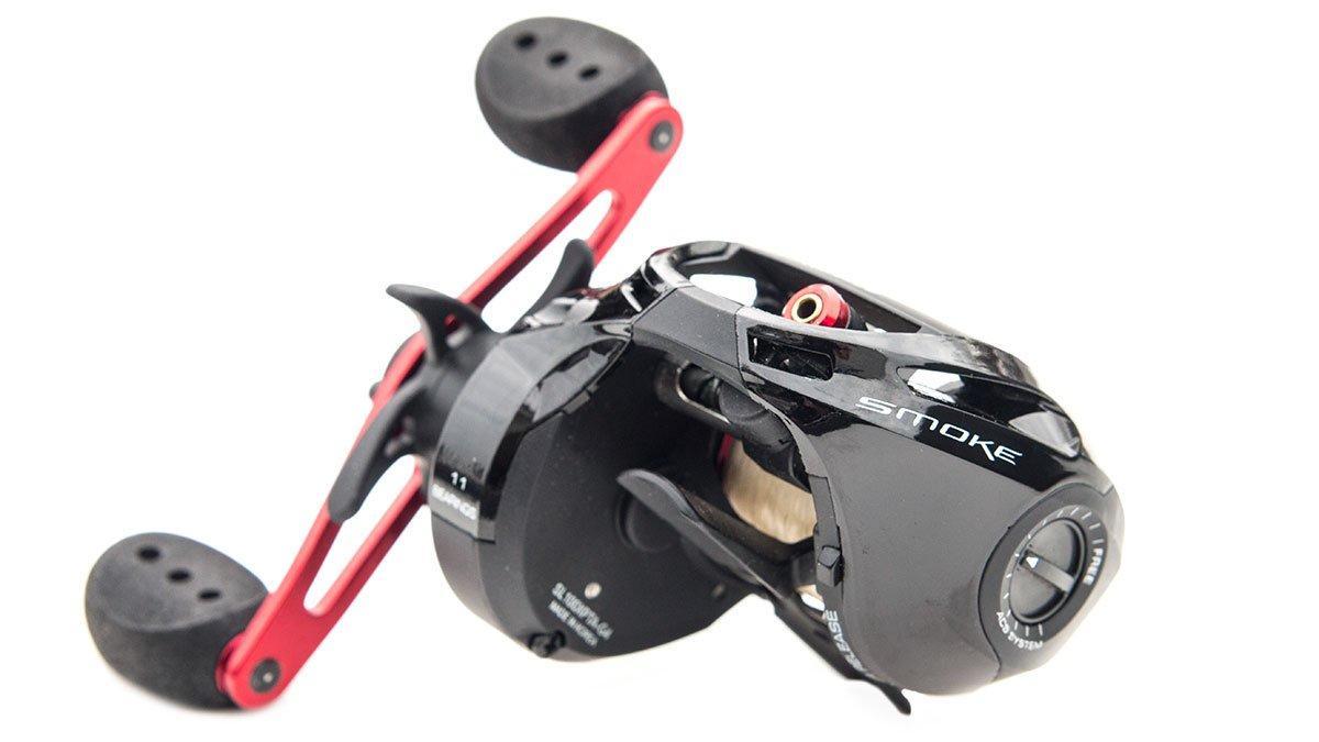 Why does my new spinning reel pause and become hard to turn when I