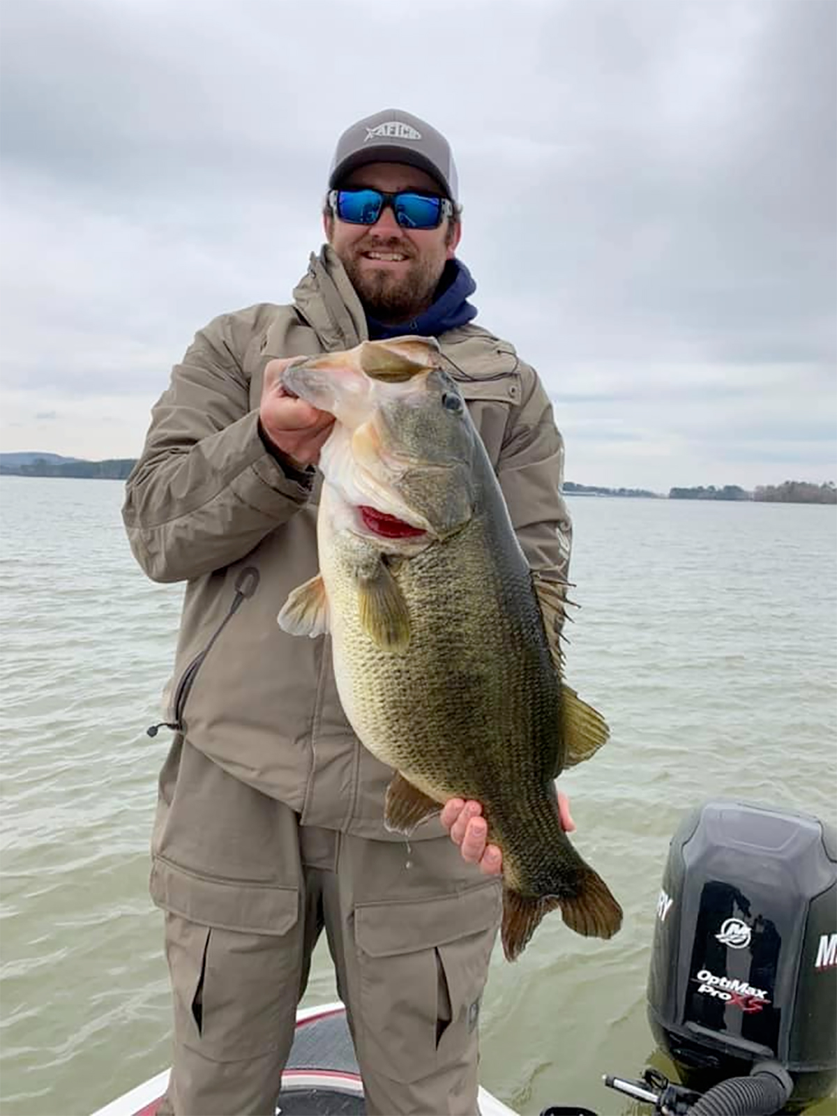 angler holding big largemouth bass
