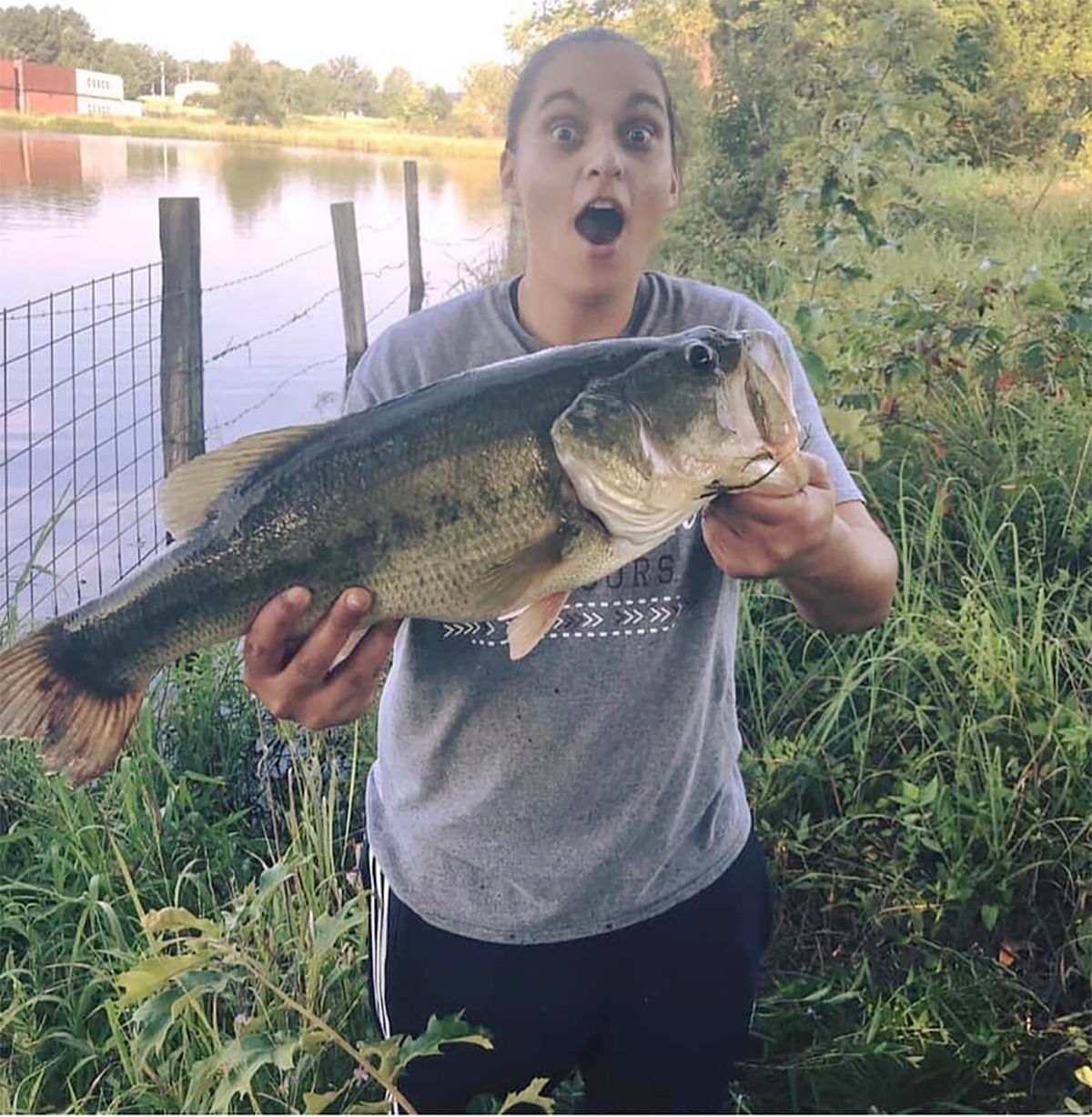 angler holding big bass