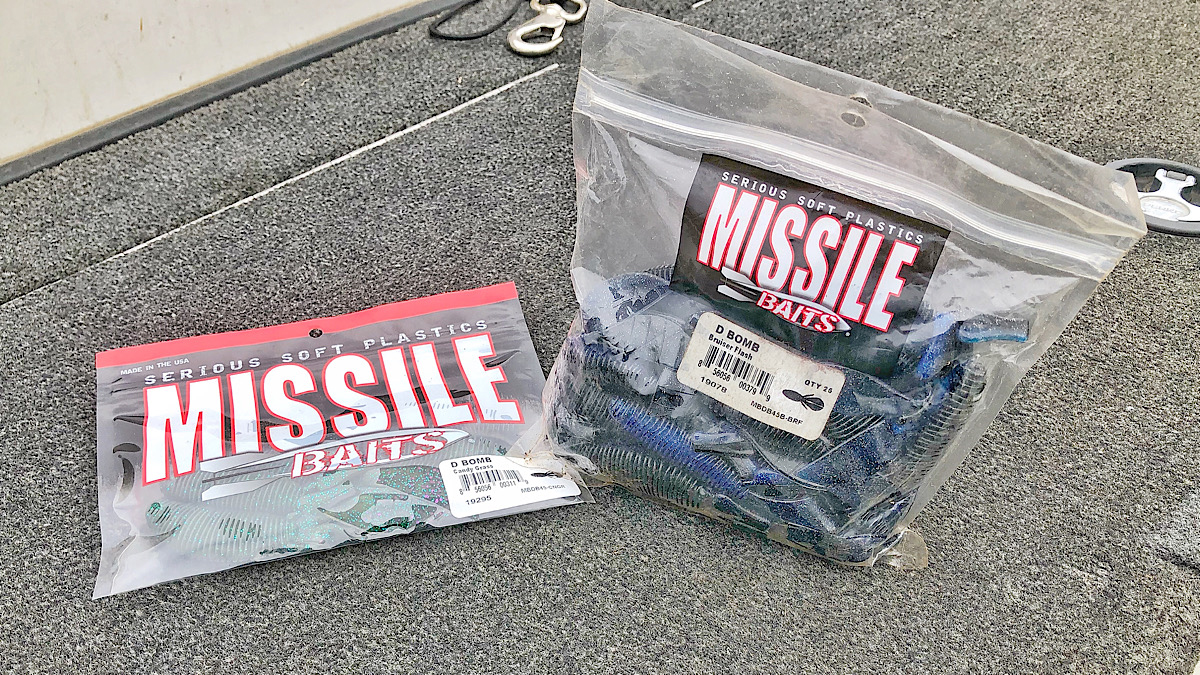 packages of bass fishing soft plastics