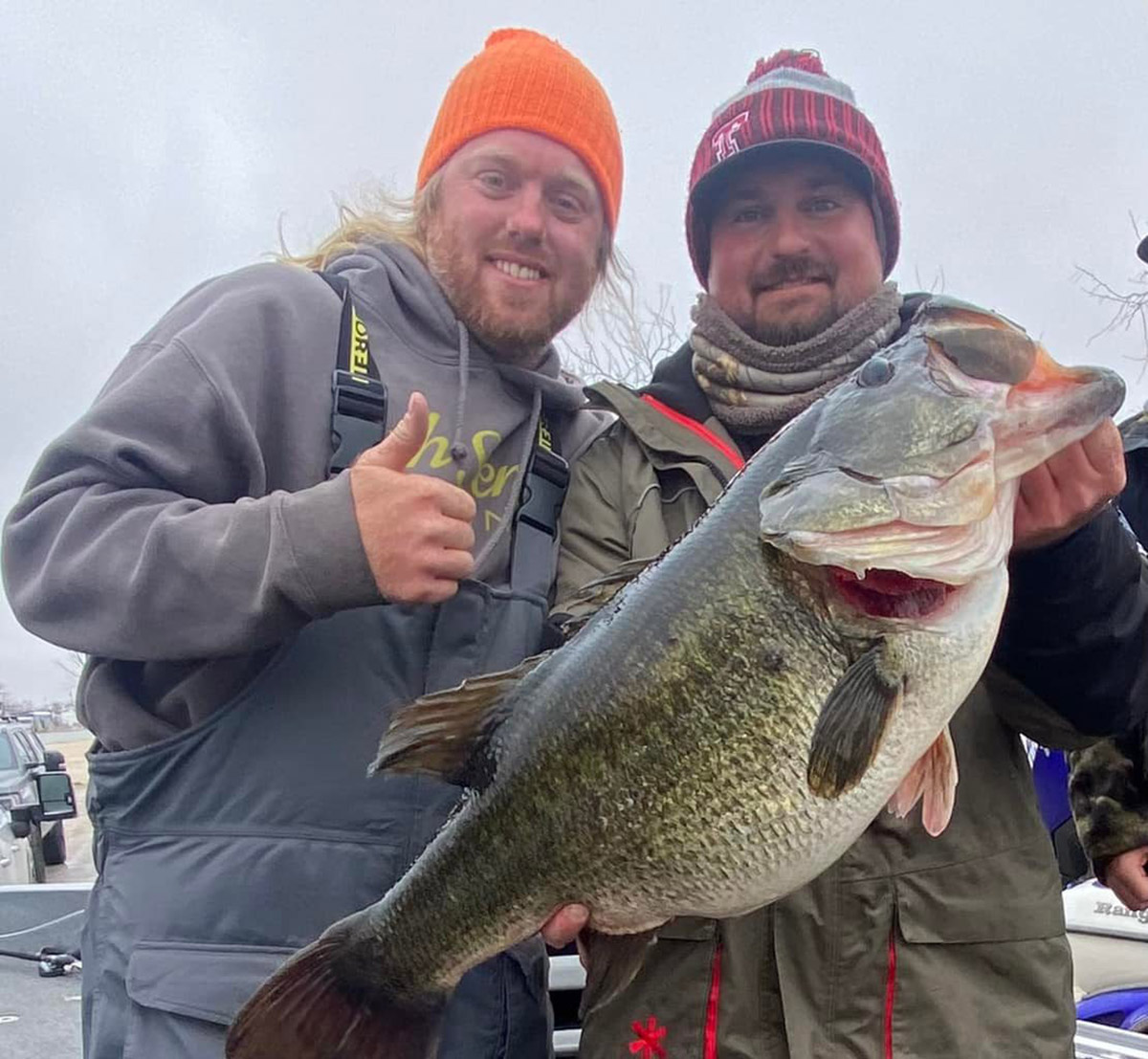 Josh Jones and Brodey Davis with the OH Ivie record bass