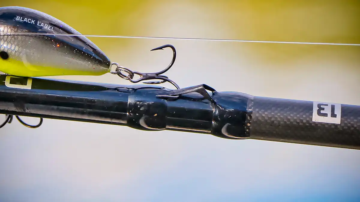 13 Fishing Defy Black Cranking Rods hook keeper