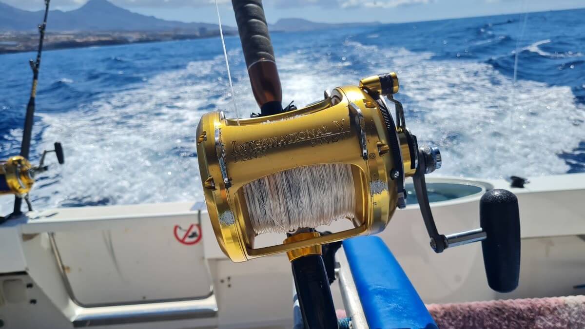 Penn International conventional reel in action on a saltwater fishing boat