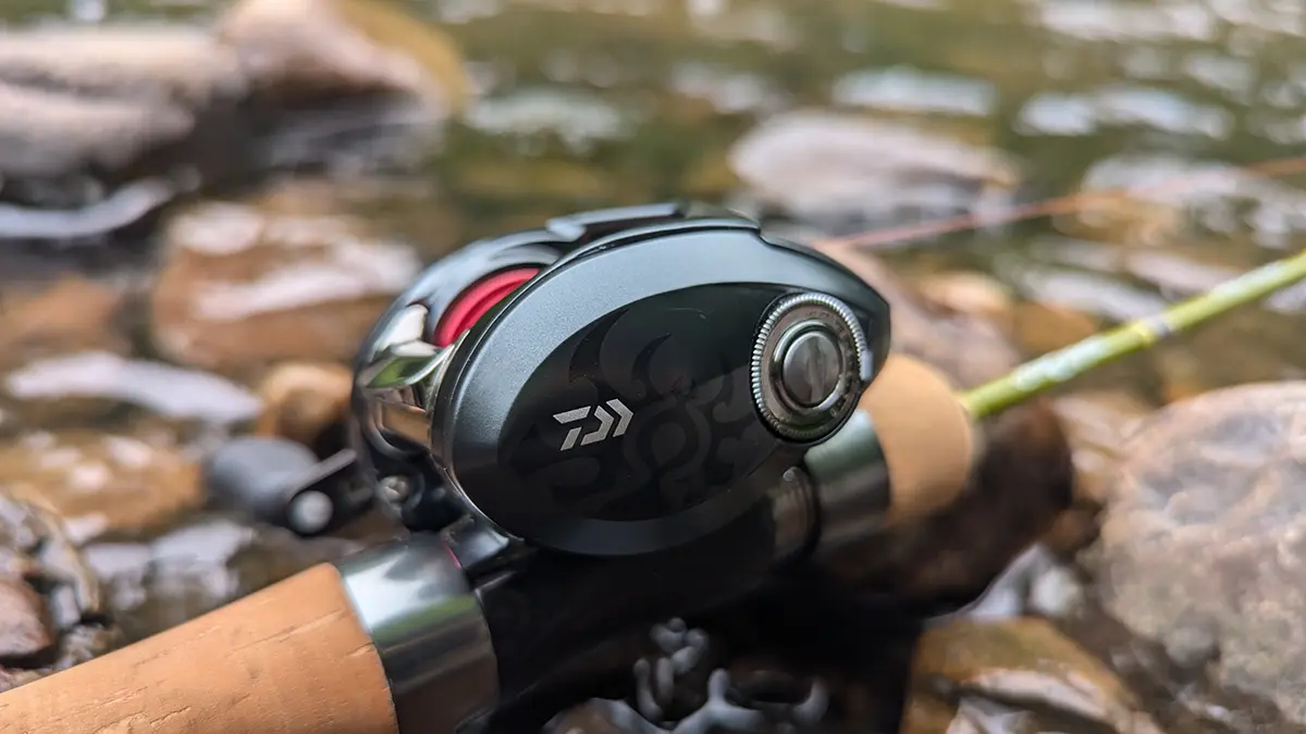 Daiwa Tatula BF TW 70 close up resting on the rocks in a stream