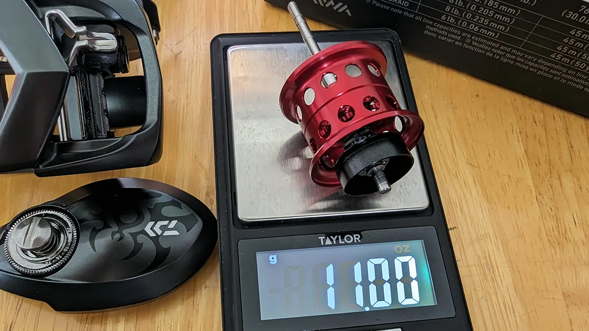 Daiwa Tatula BF TW 70 spool on a scale weighing in at 11 grams