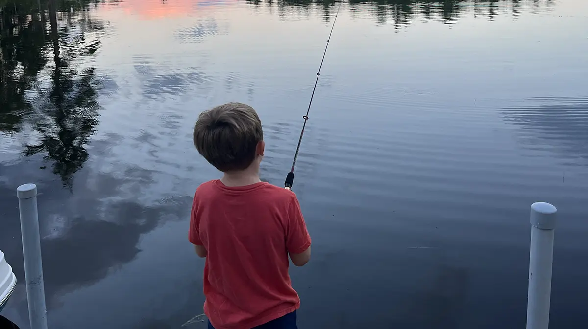 a kid fishing