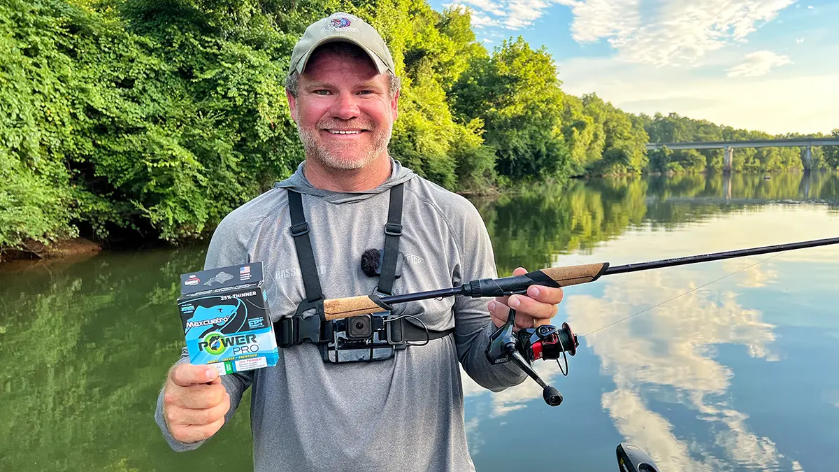 angler shaye baker on a boat holding a St.Croix Spinning Rod with a Seviin GS Spinning Reel and Braided Line