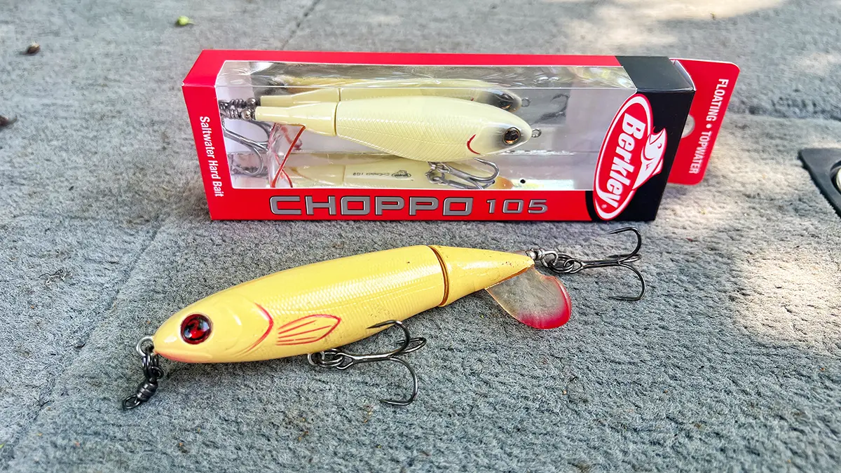 berkley choppo in packaging next to a river2sea whopper plopper resting on boat deck