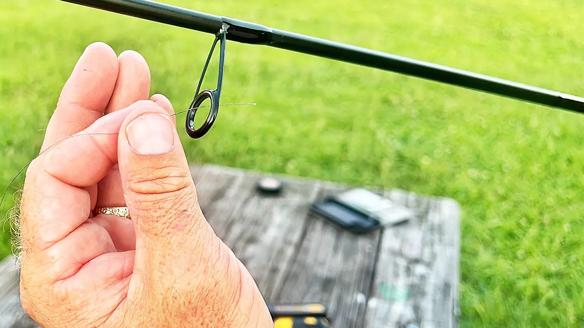 step 1: run your line line through the first rod guide