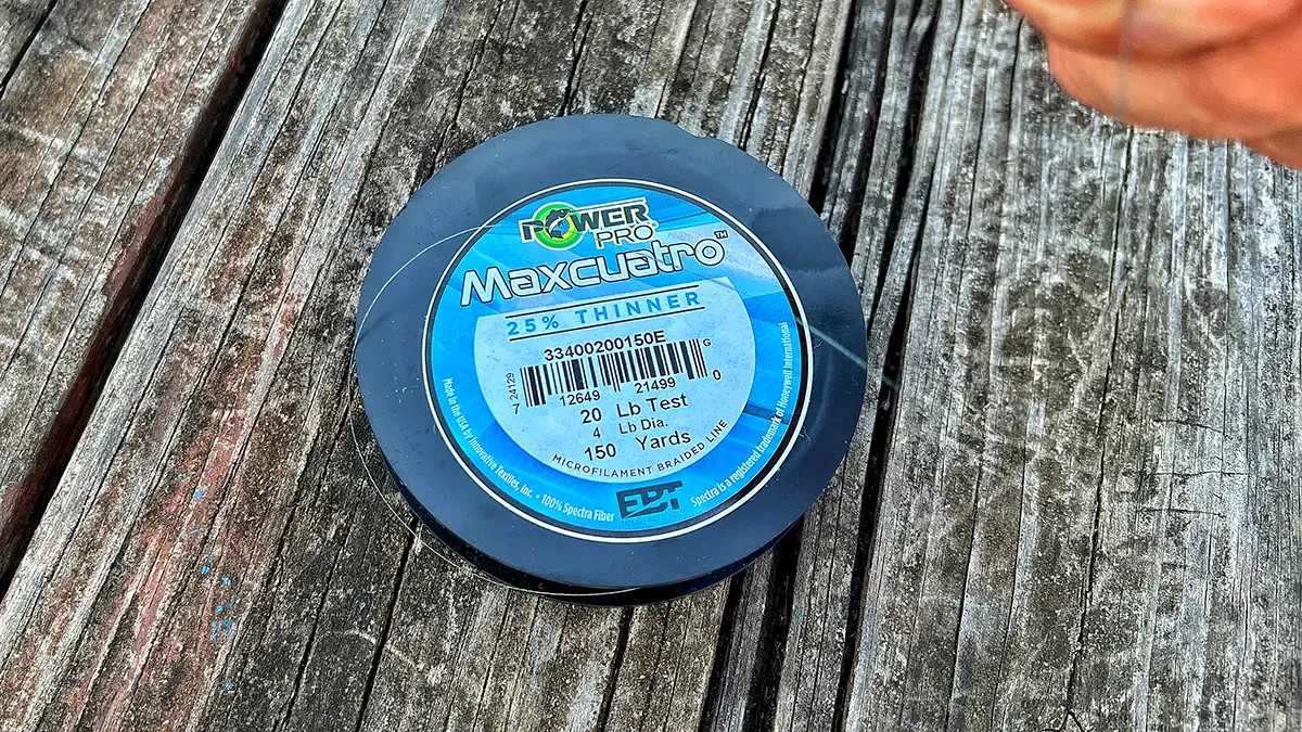 Powerpro Max Quatro Braided line laying on a picnic table