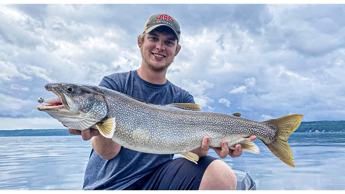 man holding trout