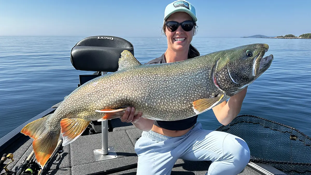 woman holding trout