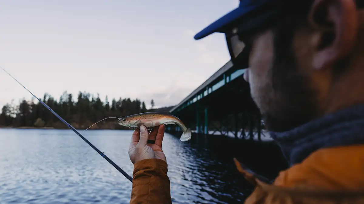 man holding lure