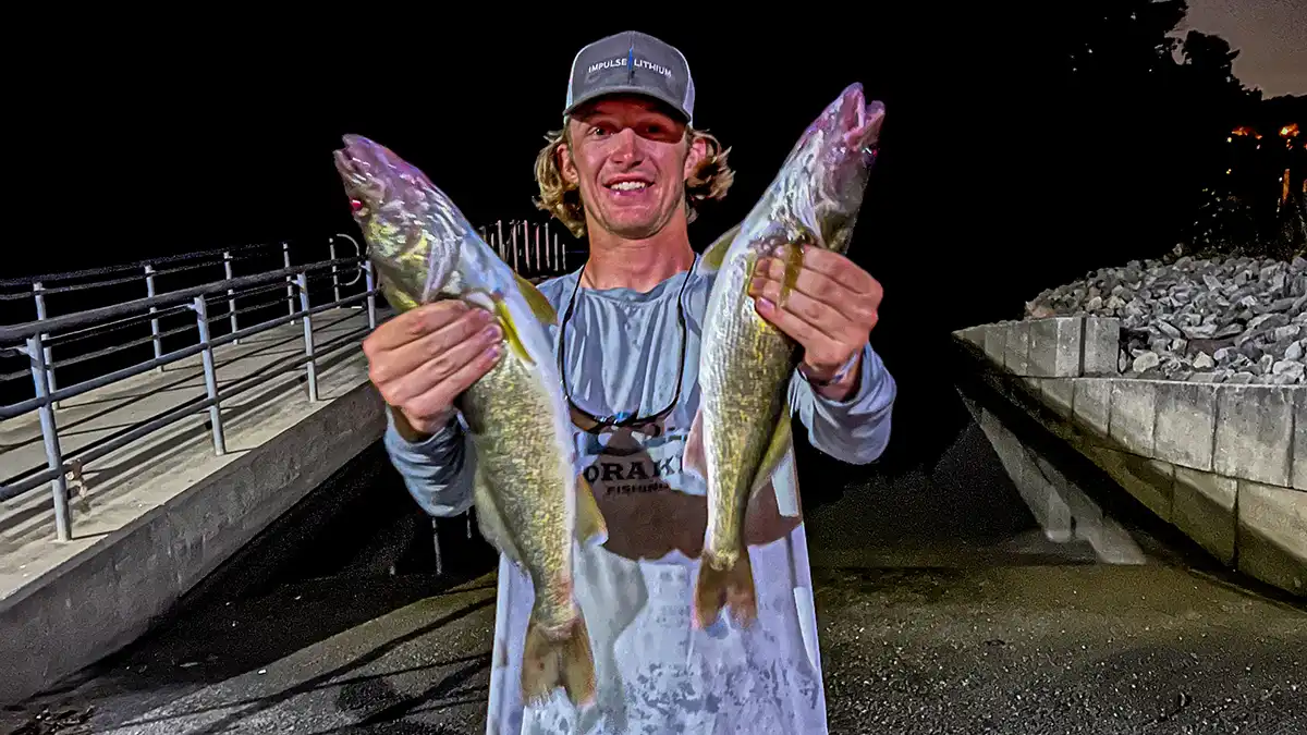 Sam with walleye caught at night