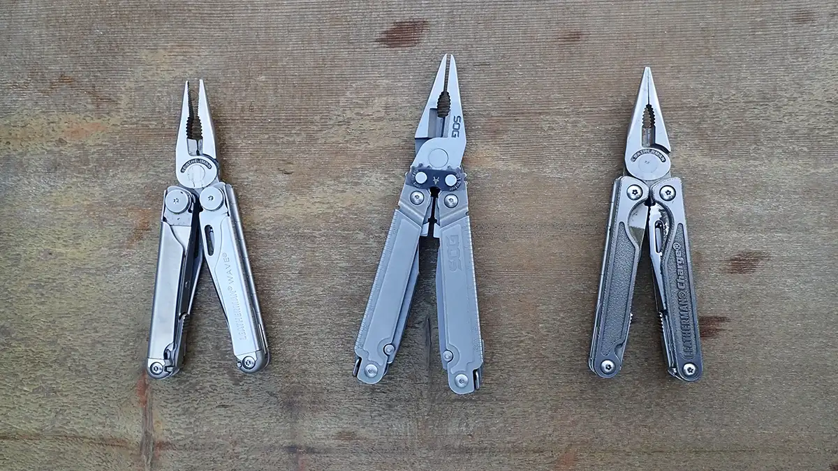 3 various multi-tools on wood decking