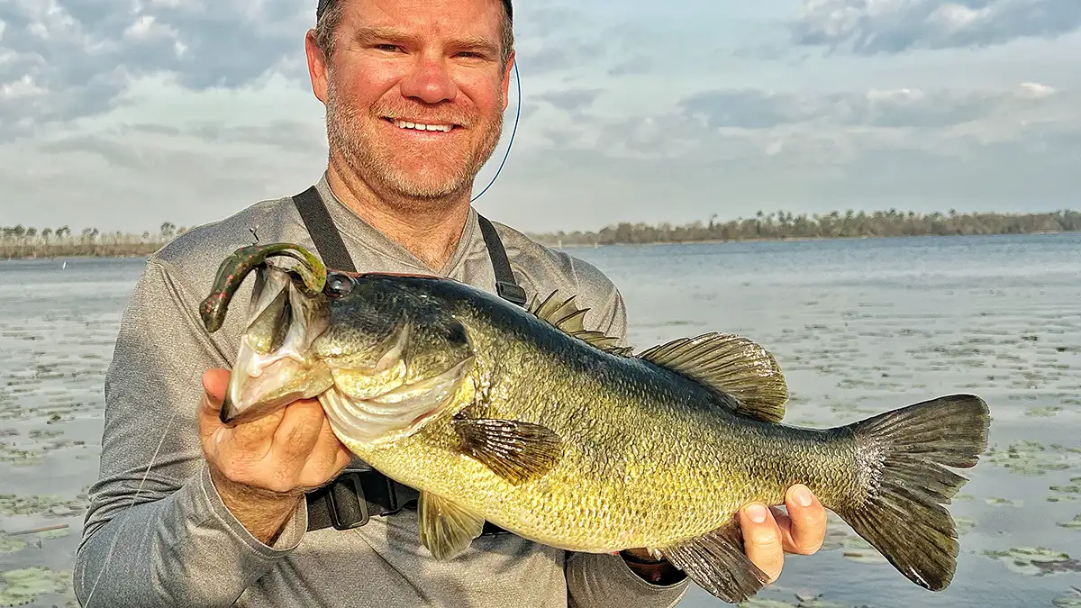 Shaye Baker holding a bass