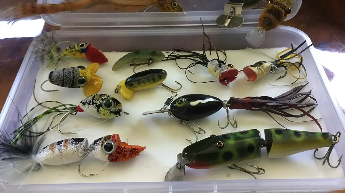 assortment of lures and flies