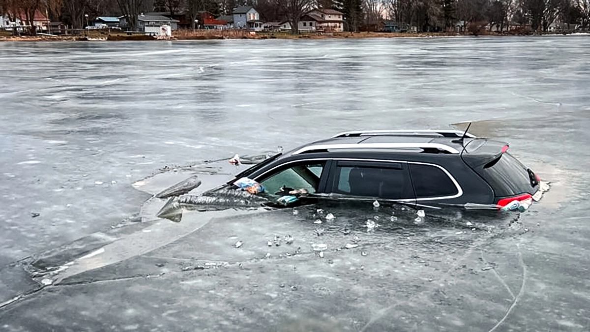 jeep cherokee falls through ice in wisconsin