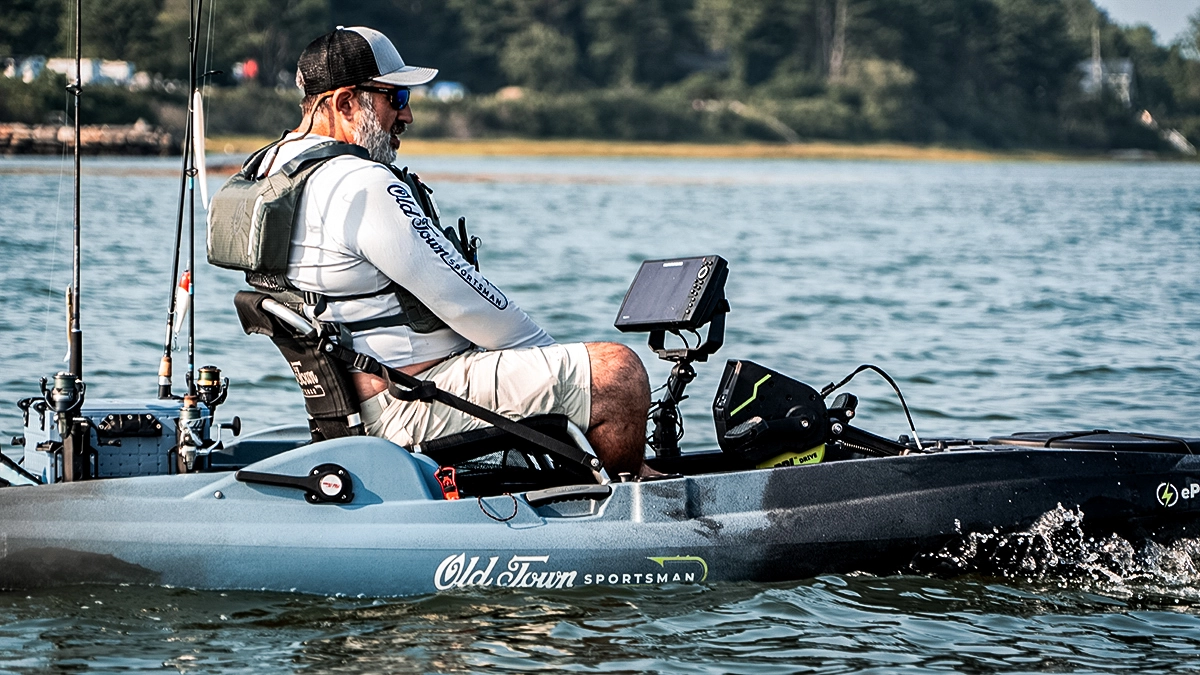 angler in old town sportsman kayak