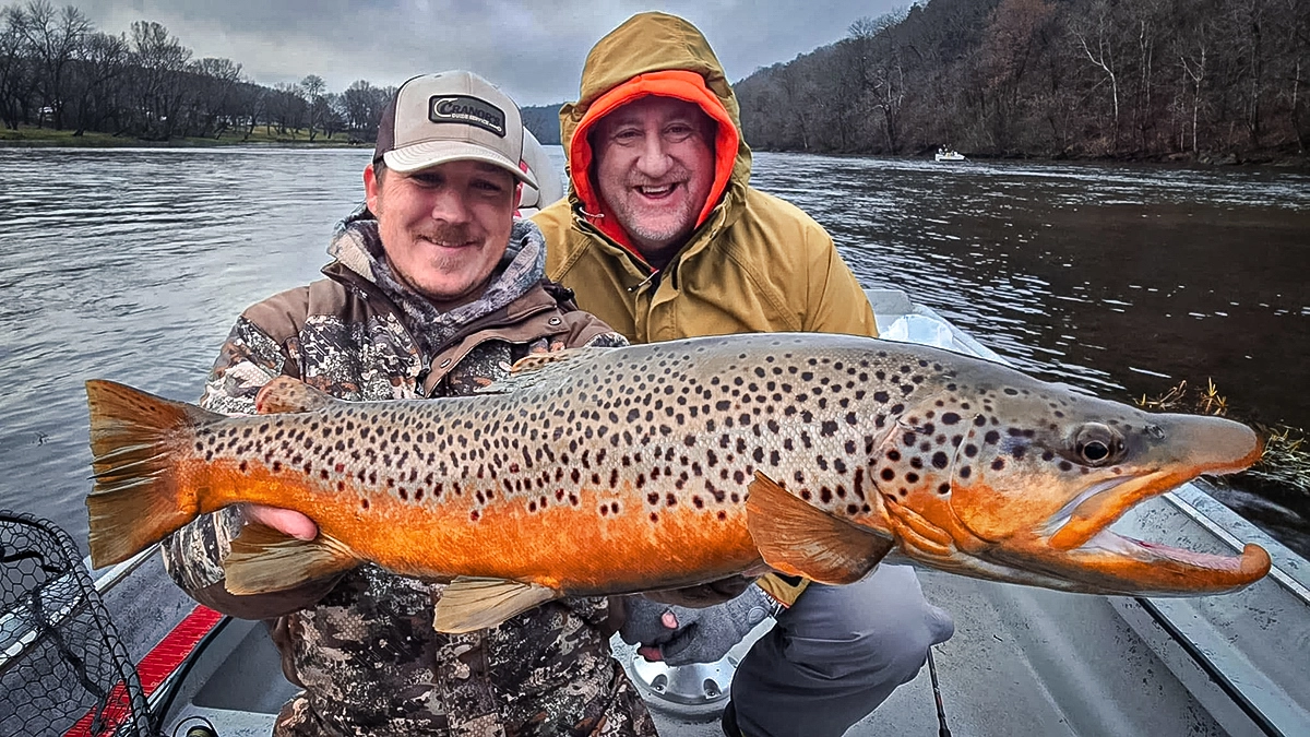 Donald Cranor white river guide with trout