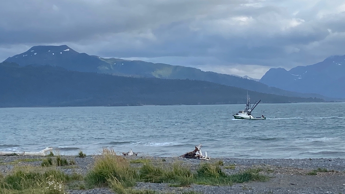 anglers in boat in tornado