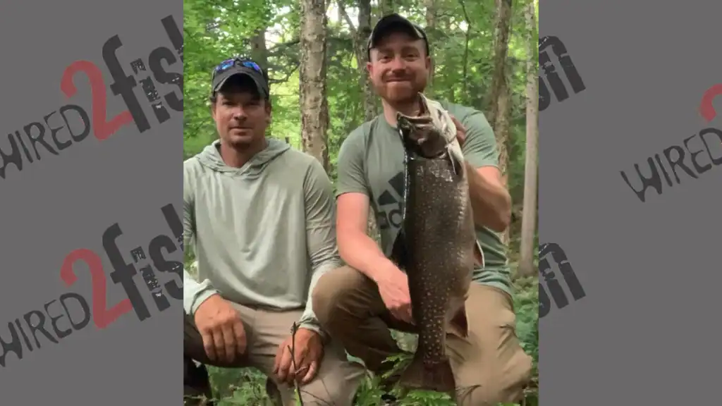 pair of anglers with NY record brook trout