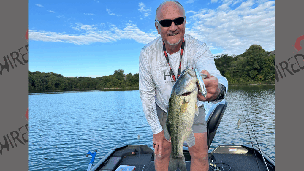 Troy McKinney with topwater bass